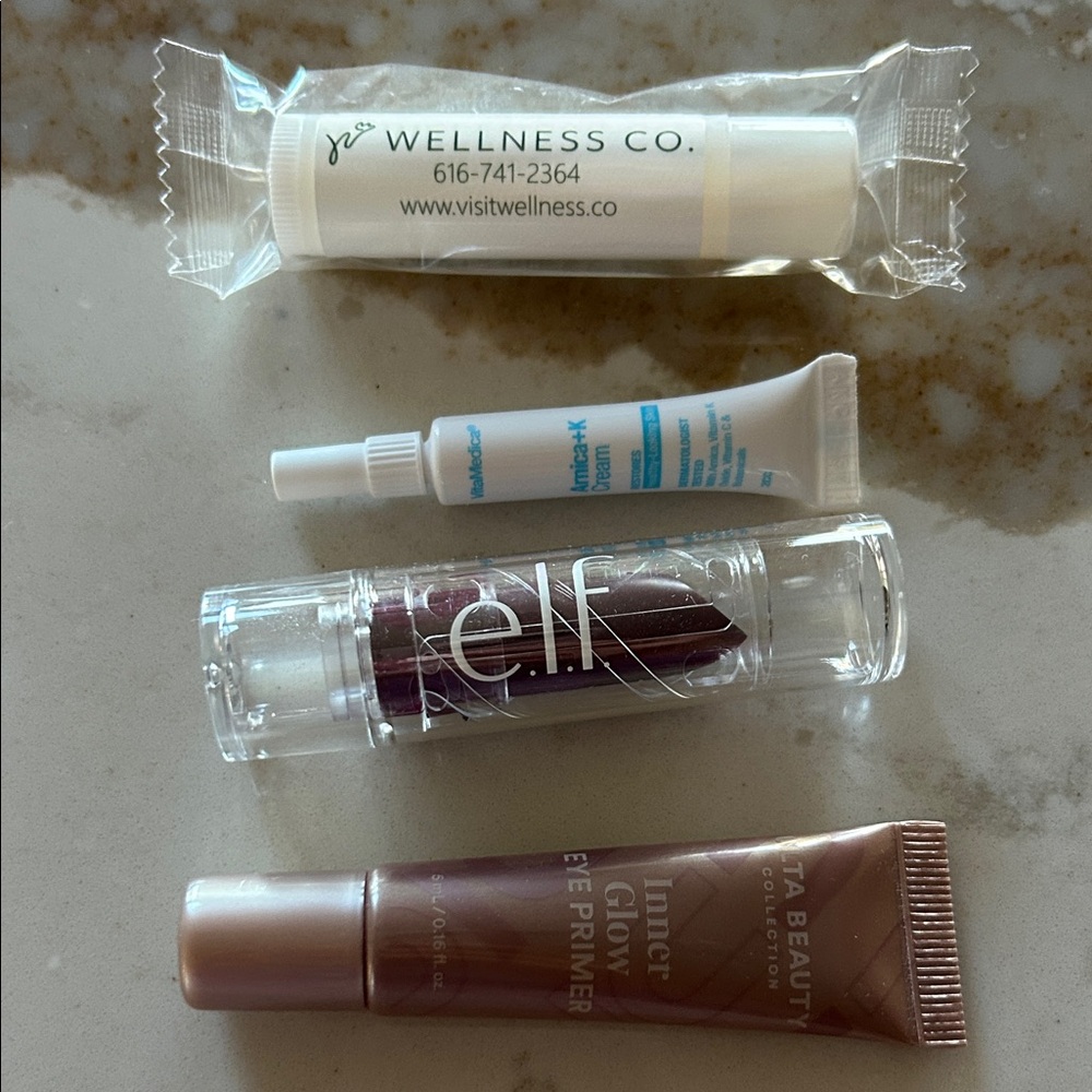 Various make-up samples, Elf lipstick, chapstick, eye primer